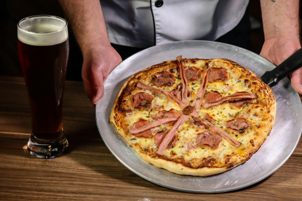 Pizzas e Cervejas Artesanais: Como Criar a Combinação Perfeita